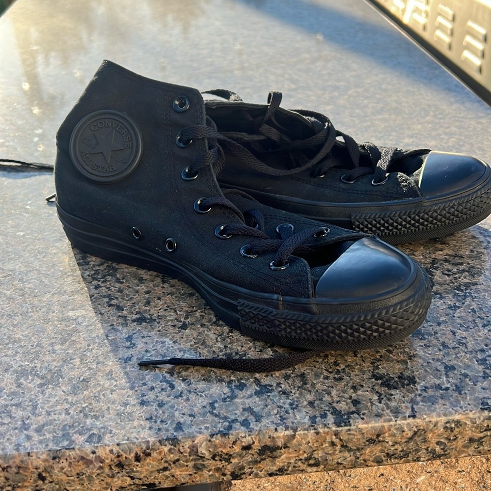 Converse high top sneakers in black